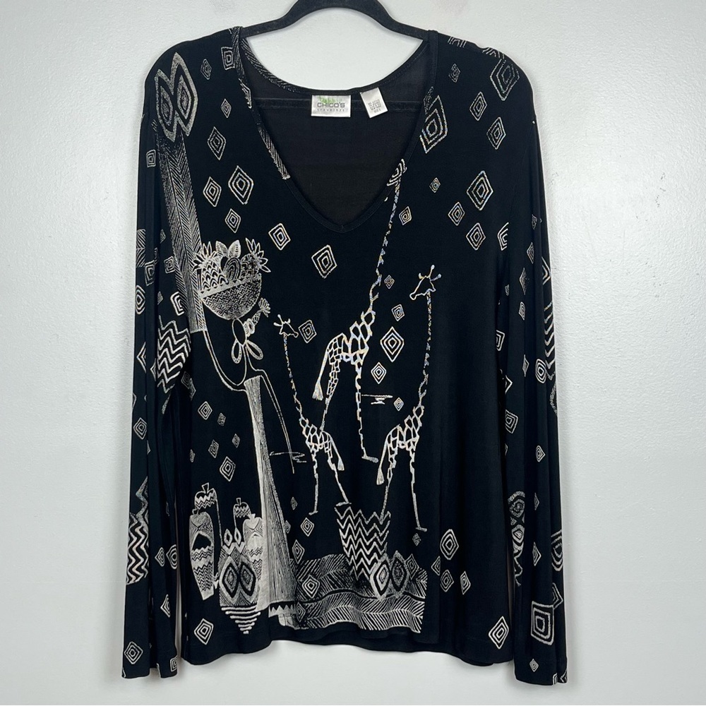 Chico’s Travelers black African giraffe graphic print slinky knit blouse, XL.
